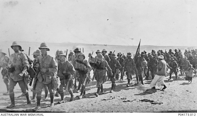 Unidentified Australian soldiers marching in lines on the top of the ...