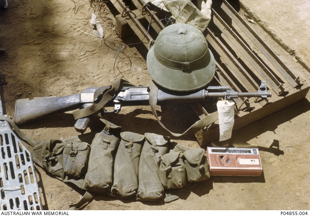 A set of captured enemy equipment comprising a webbing set of four ...