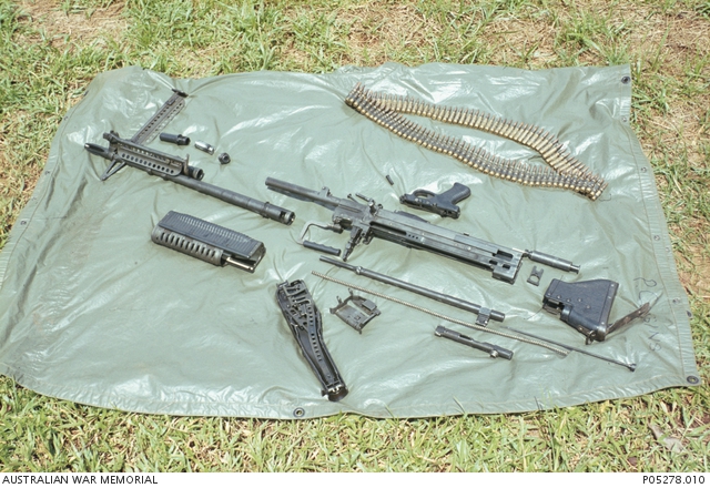 A stripped down M60 General Purpose Machine Gun and a 100 round belt of ...