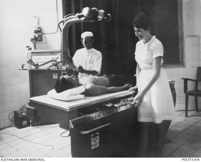 A Vietnamese patient being prepared for xray by Miss Noelle Courtney