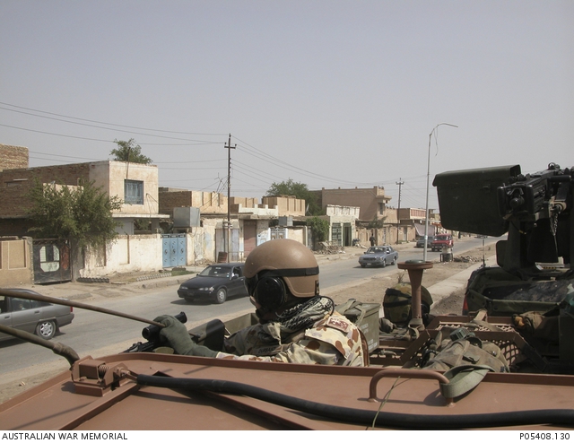 An Australian soldier, Durrant, undertaking surveillance from an ...