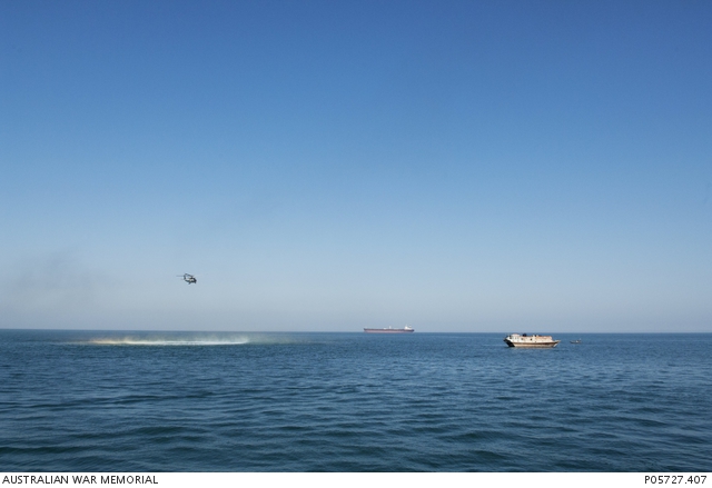 An Australian boarding party in a Rigid-Hulled Inflatable Boat (RHIB ...