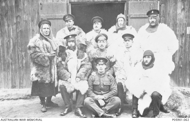 Outdoor portrait of a group of ten allied Prisoners of War (POW) at ...