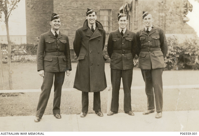 Informal group portrait of four Australian members of the RAAF visiting ...