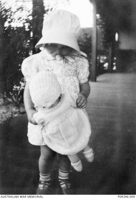 Wendy Rudduck wearing blue dress with smocking and buttons down front ...