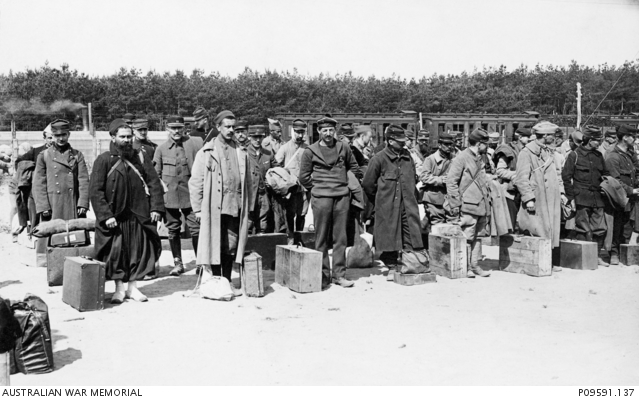 A large group of unidentified French prisoners of war (POW) waiting to ...