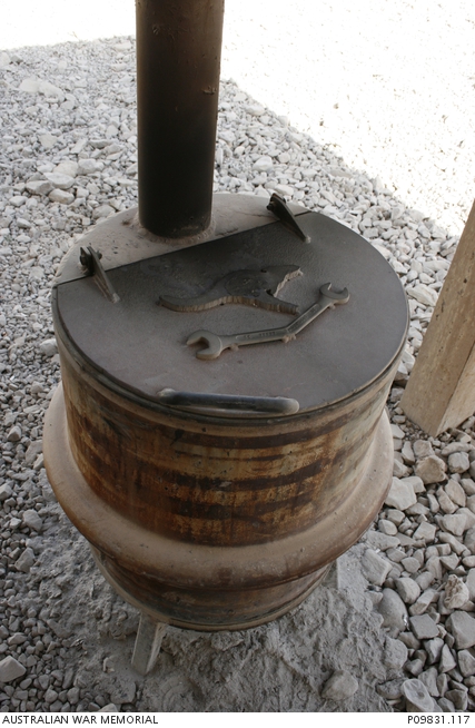 A rubbish bin made from two Bushmaster wheels welded together. Taken by ...