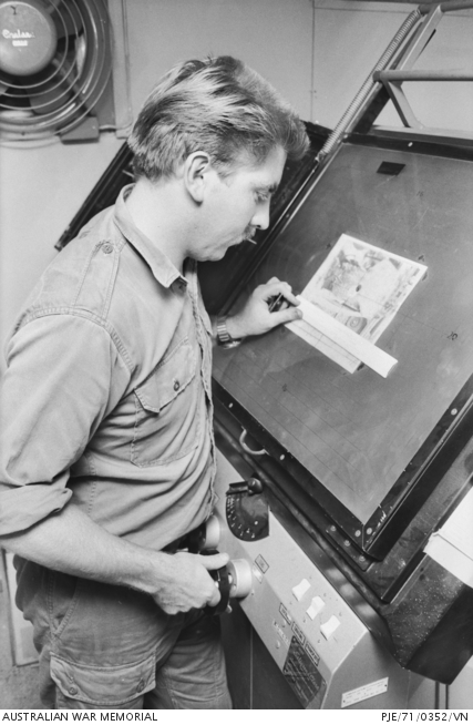 South Vietnam. July 1971. Camera operator Sapper Garran Hill of Bendigo ...