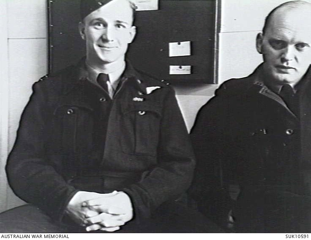 England. C. 1940. Portrait of RAAF members 408044 Flying Officer W. T ...