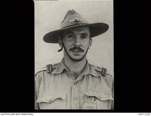 India. C. 1944. Portrait of Flying Officer J. Sandilands, RAAF with his ...