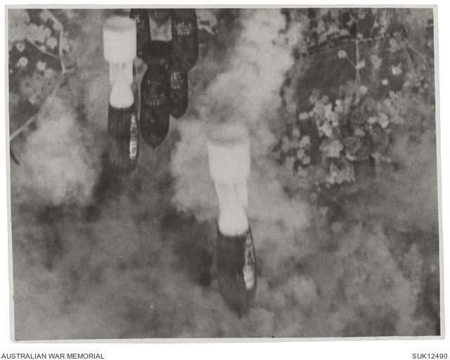 France. 1944-06-29. Heavy bombs fall onto a smoke shrouded target from ...