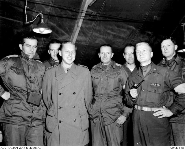 A group of United Nations officers meet in the truce camp at Panmunjom ...