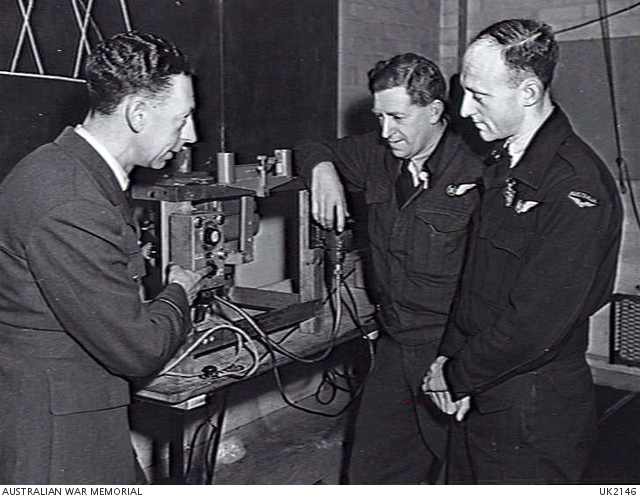 England. C. 1944-10. Aircrew members being instructed in the operation ...