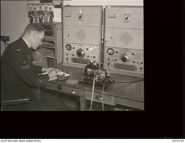 Laverton, Vic. C. 1944-12. An RAAF telegraphist recording ...
