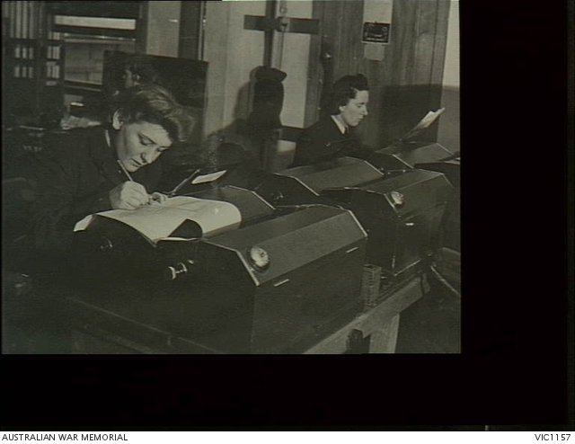 Melbourne, Vic. C. 1943. WAAAF telegraphists operating teleprinter ...