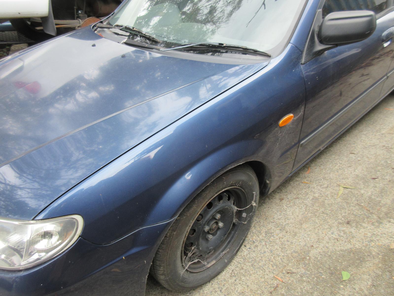 View Auto part A/C Condenser Mazda 323 2002