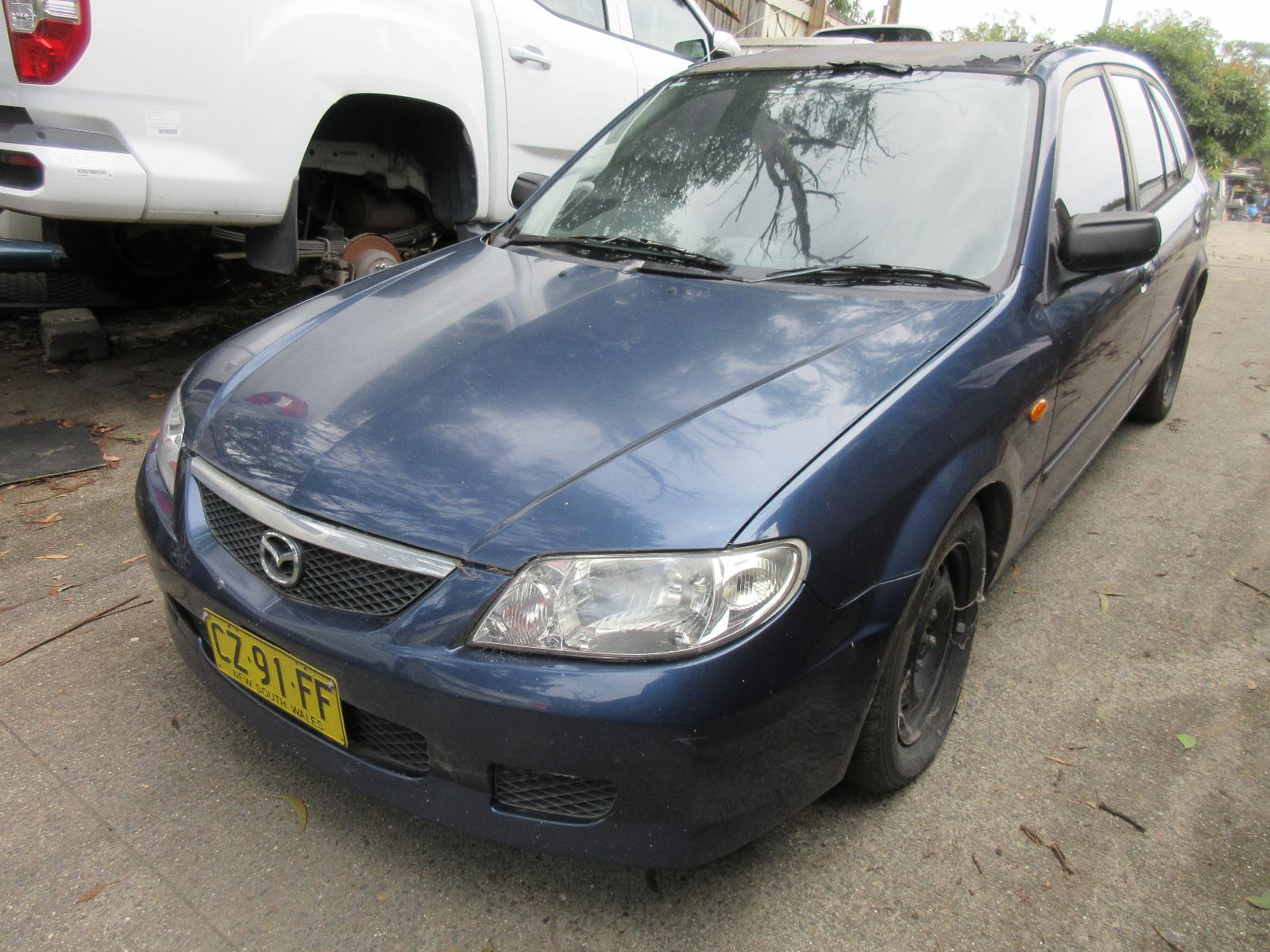 View Auto part A/C Condenser Mazda 323 2002