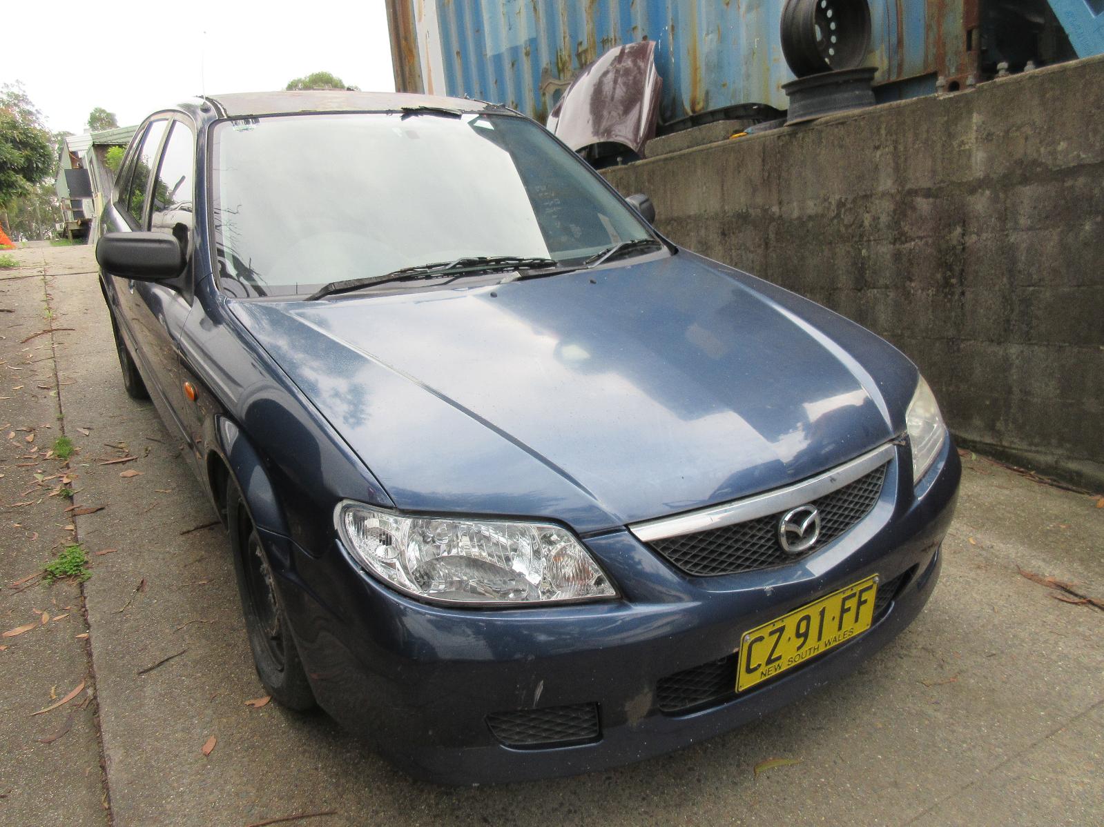 View Auto part A/C Condenser Mazda 323 2002