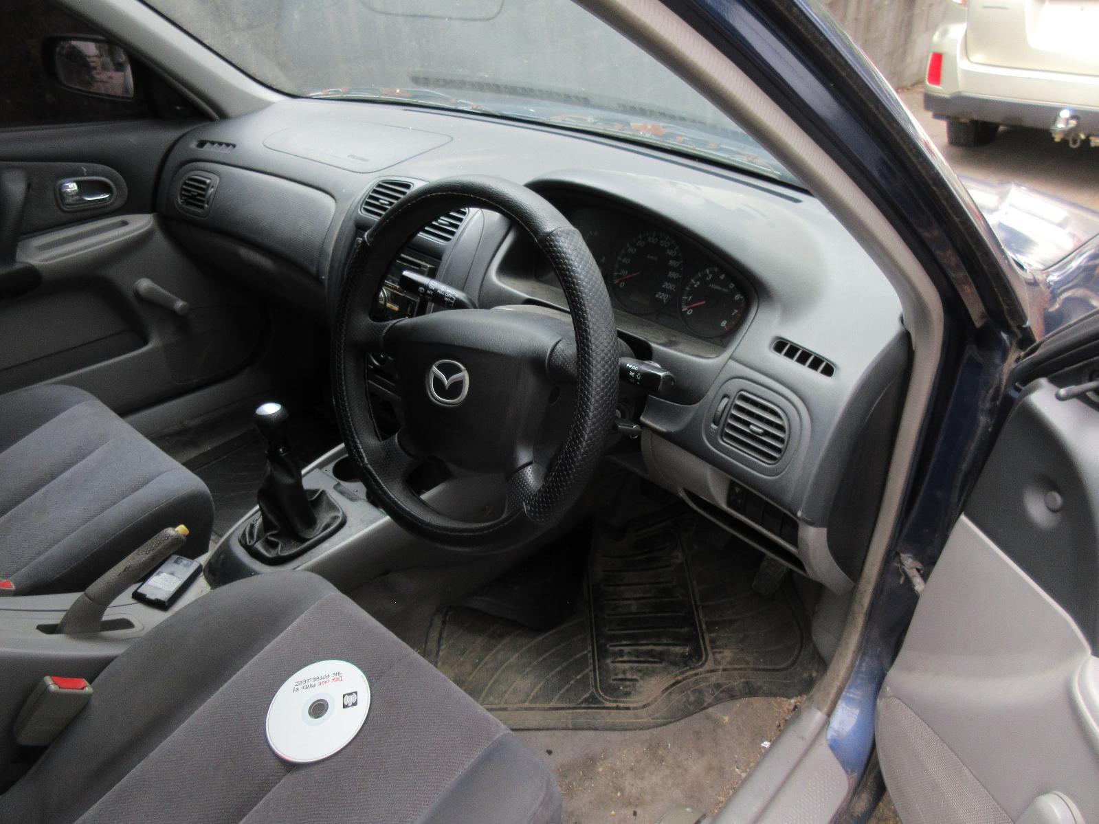 View Auto part A/C Condenser Mazda 323 2002