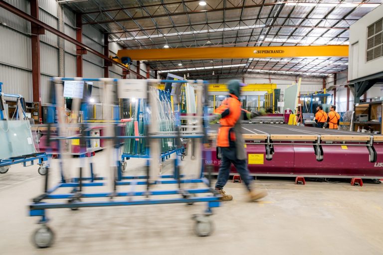 Tough Glass team moving finished glass through the Wangara factory.