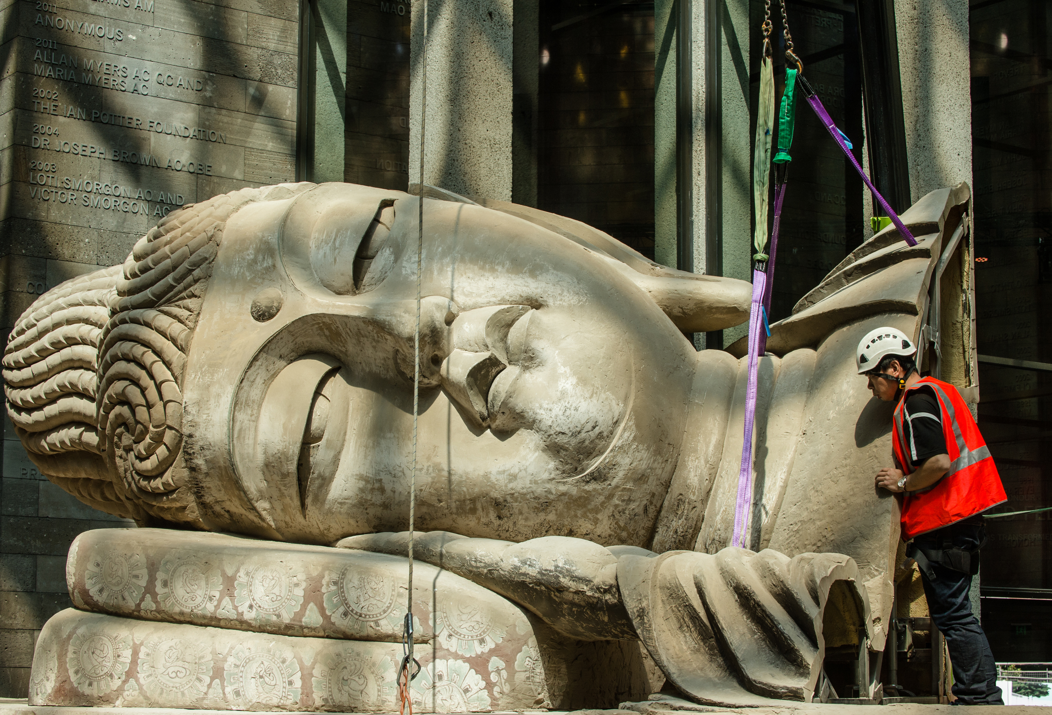 Eternity Buddah in Nirvana by Chinese artist Xu Zhen being installed at the NGV. Picture: Eugene Hyland