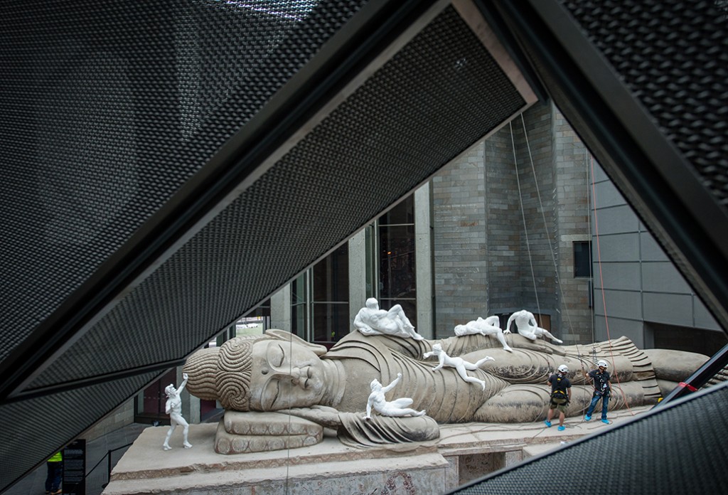 The final elemets of "Eternity Buddah in Nirvana" by Chinese artist Xu Zhen being installed at the NGV. Picture: Eugene Hyland
