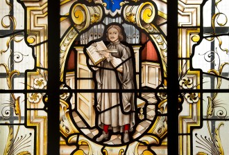 Thomas Tallis, composer of English choral music, depicted in stained glass window at St Alfege church, Greenwich, London.