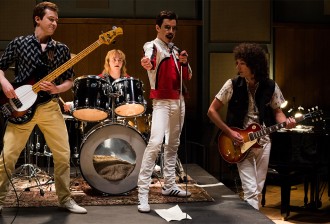 Joe Mazzello (John Deacon), Ben Hardy (Roger Taylor), Rami Malek (Freddie Mercury), and Gwilym Lee (Brian May) star in Twentieth Century Fox’s BOHEMIAN RHAPSODY. Photo Credit: Alex Bailey
