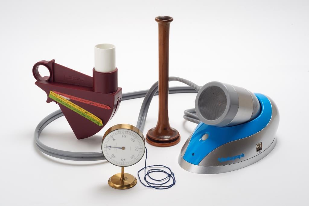 Ferraris medical ltd. peak flow meter, c.1990s_ Quain stethometer, 1860–80_ Laennec-type stethoscope, c.1820_ Vitalograph Pneumotrac Spirometer, c.2010s courtesy Royal College Physicians London