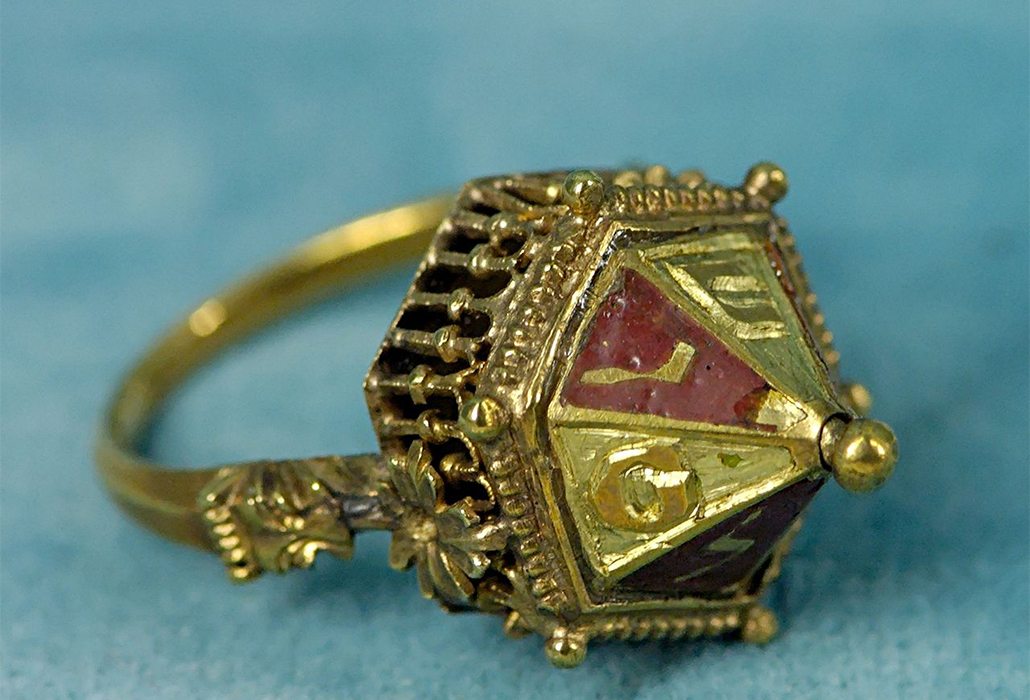 Gold Jewish wedding ring with Hebrew letters. Chased and enamelled gold and filigree, early 14th century, found at Colmar (Alsace, France) in 1863 MaterialGold, silver, bronze, iron, courtesy Musée de Cluny, Paris
