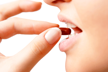 woman_taking_supplement