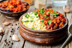 buttered millet with tomato eggplant curry