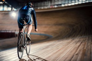 Racing cyclist on velodrome