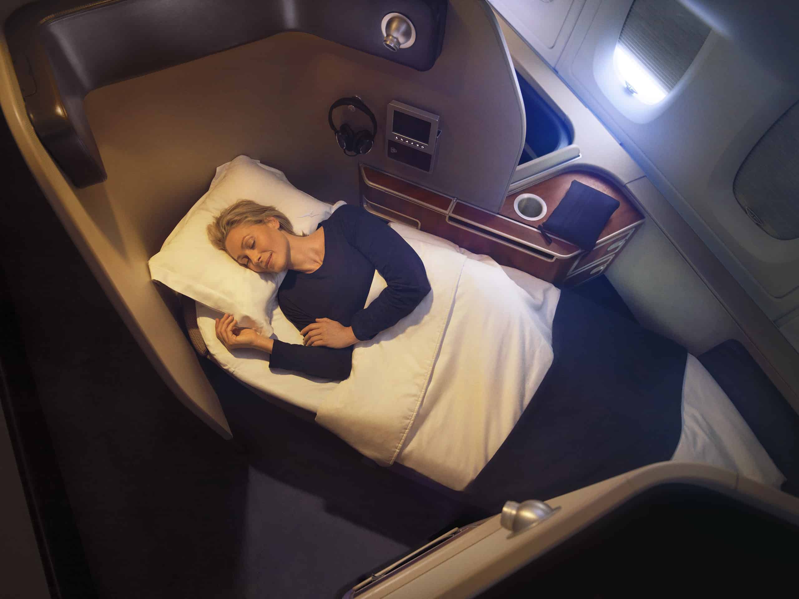Qantas First Class woman sleeping Wayfarer