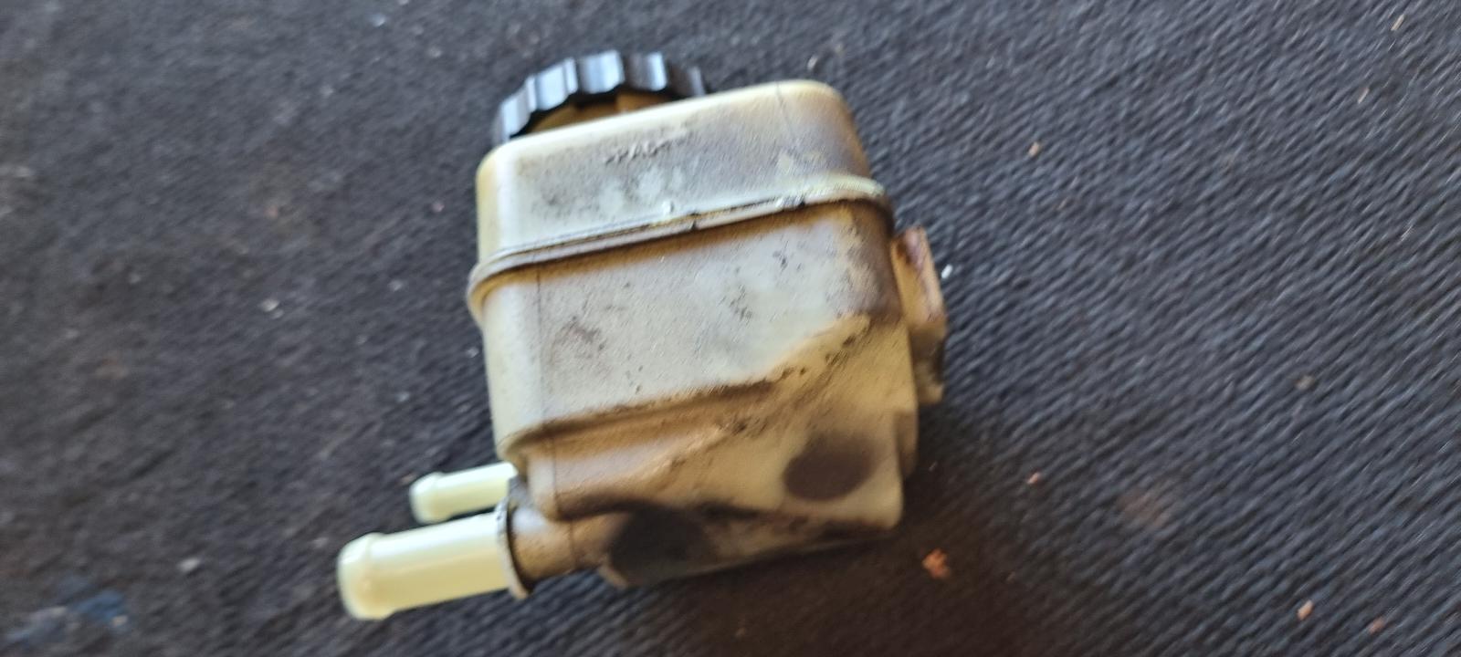 View Auto part P/S Reservoir Holden Commodore 2010