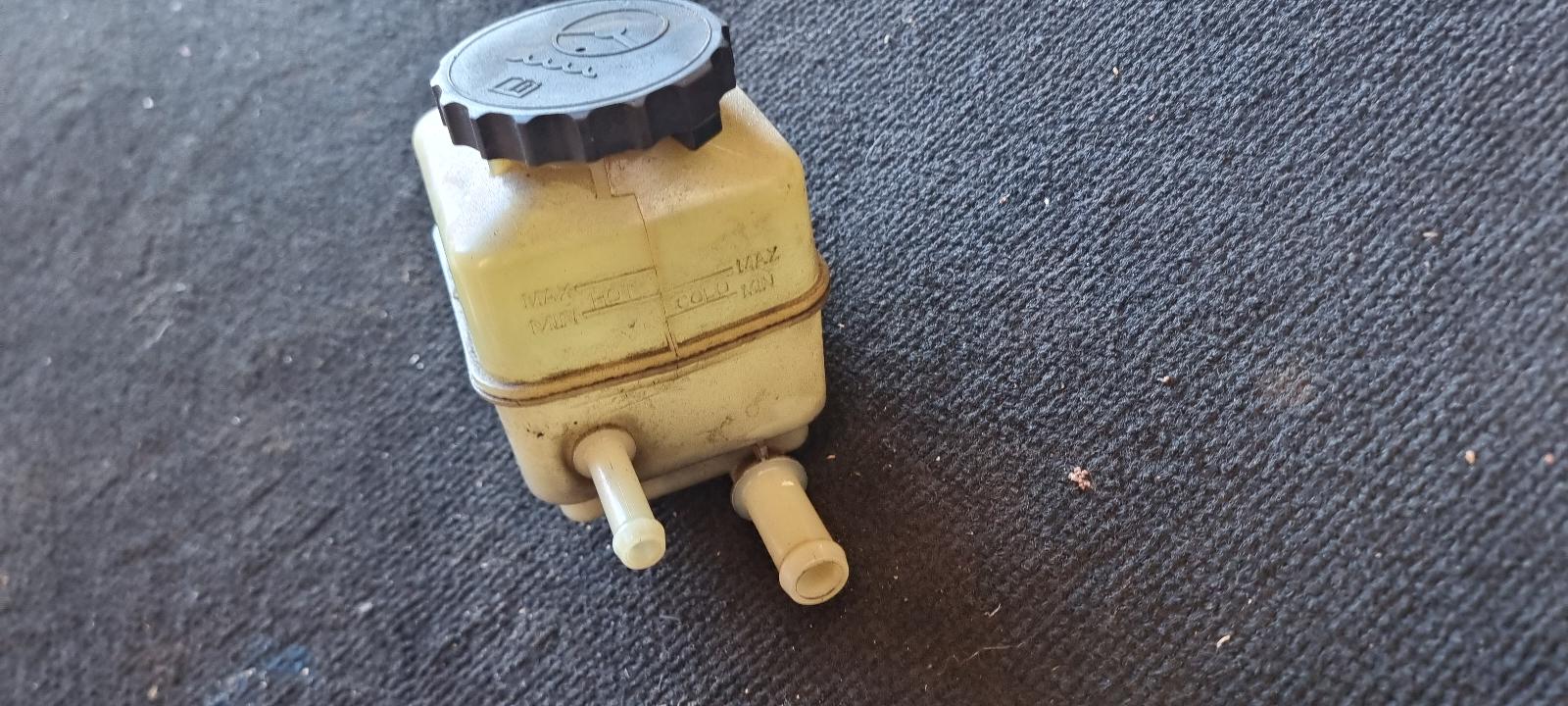 View Auto part P/S Reservoir Holden Commodore 2010