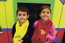 Hristos (6 yrs) and Hannah Ballios (8 yrs)(NAMES OK) at the Winter warmers craft station with their scarf creations