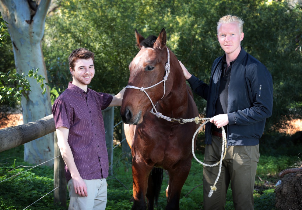 Filmmakers Jordon Prince-Wright and Axel Karlsson with Gus the horse. |Picture: David Baylis www.communitypix.com.au d454970