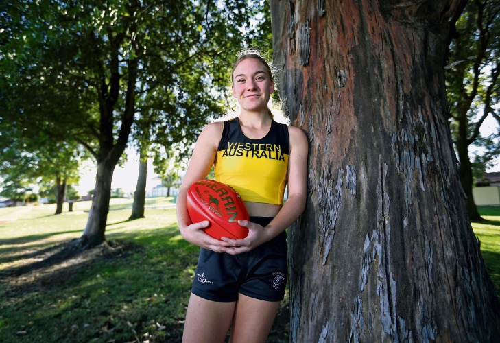 Hurdler and footballer kicking goals for WA