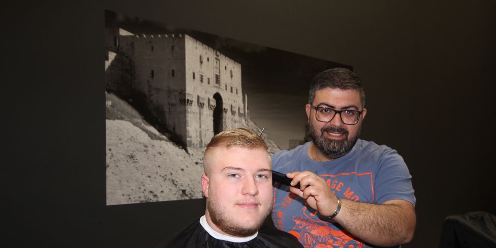 Close shave in war leads Syrian man to start life afresh as Perth barber