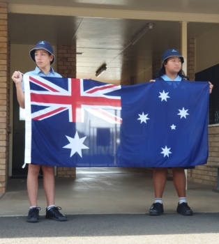 Students On Own With Flag Edit