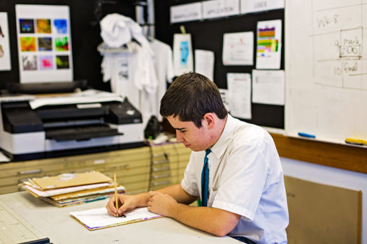 high-school-boy-writing