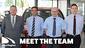 John Hughes Jeep dealership team