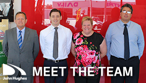 John Hughes Kia dealership team