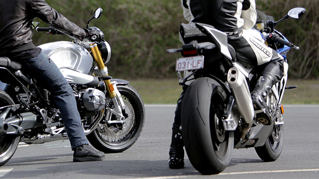 Motorcycle rider with protective clothing