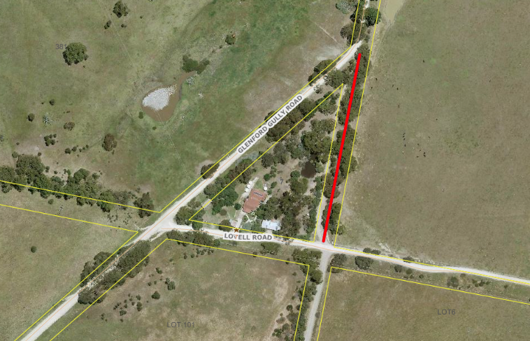 Aerial map of Ocean Road. A line demonstrates the portion of road connected to Glen Gully Road and Lovell Road. The image shows the unmade road is heavily vegetated.