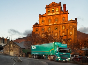 Toll truck in front of cascade