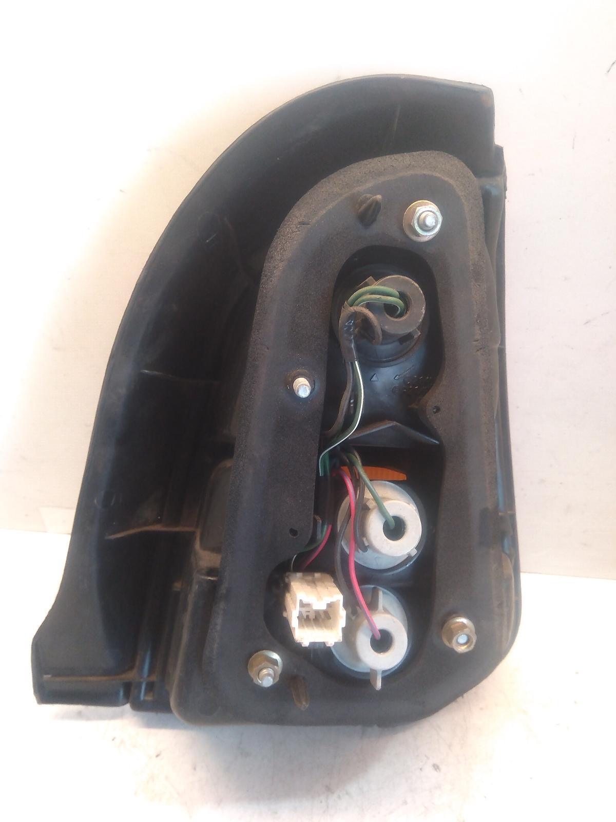 View Auto part Left Taillight Mitsubishi Mirage 1997