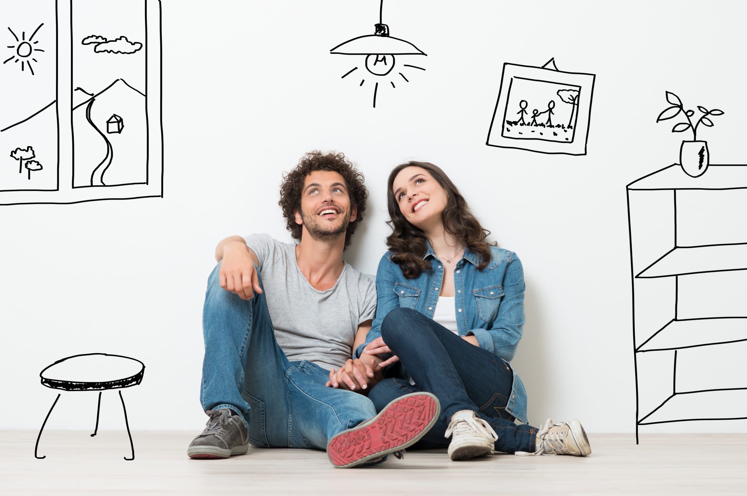 Happy Couple Dream New Home Portrait Of Happy Young Couple Sitting On Floor Looking Up While Dreaming Their New Home And Furnishing