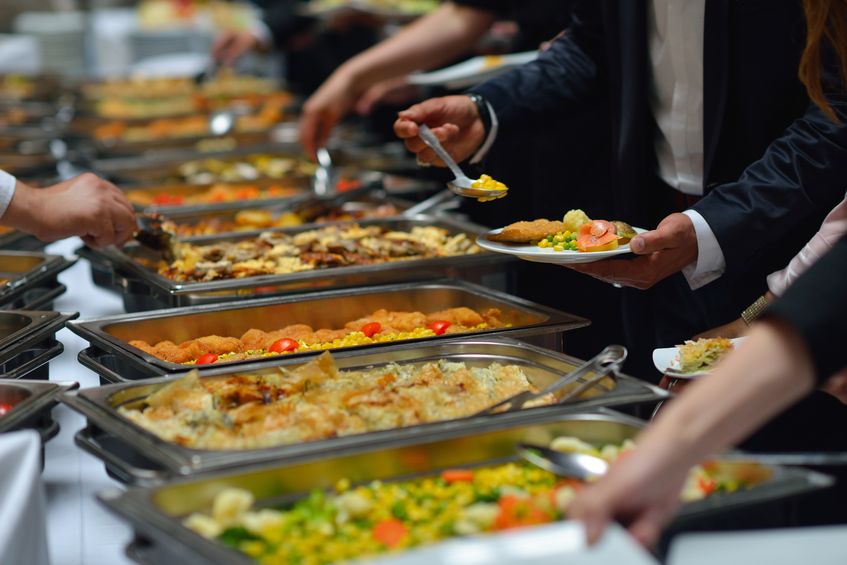 food-services 19774813 - people group catering buffet food indoor in luxury restaurant with meat colorful fruits and vegetables
